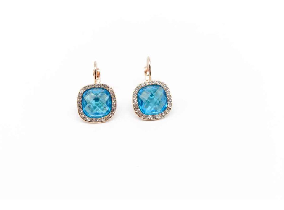 Earring hanging in rose gold with square colored blue rhinestones.