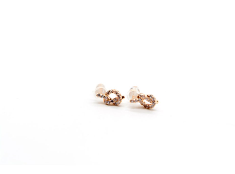 925 sterling silver earrings in the shape of a knot, pink gold color with rhinestones.