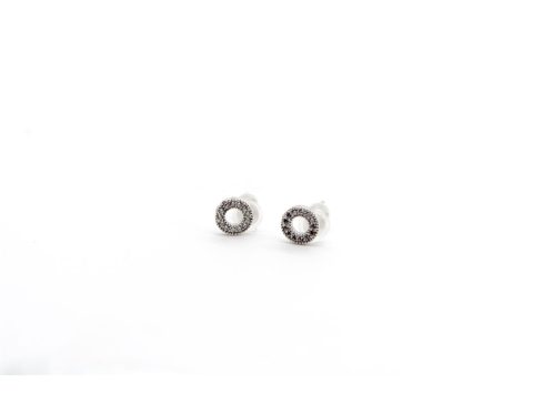 Stud earrings made of silver 925, round in shape with rhinestones, perforated in the center, silver color.