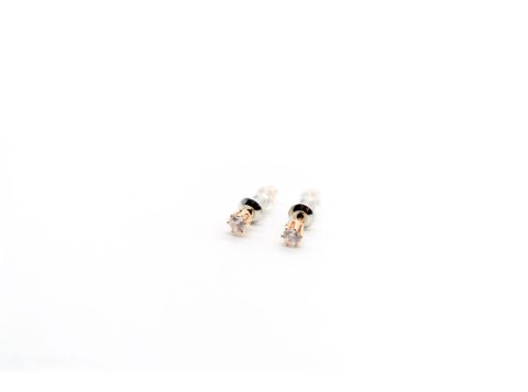 Stud earrings made of 925 silver, in the shape of a round mini with rhinestones, pink gold color.