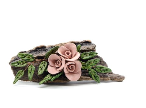 Handmade decorative branch with pink flowers from clay to sea wood