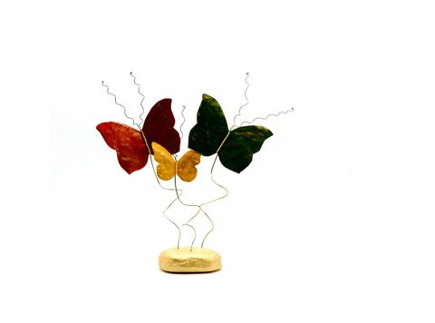 Handmade forged bronze butterflies painted in green red.