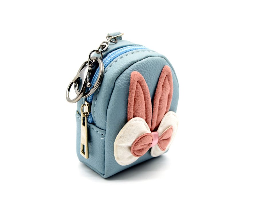 Handmade purse-keychain, leather in light blue color, decorated with fabric hare ears in pink vintage color and bow pink-white