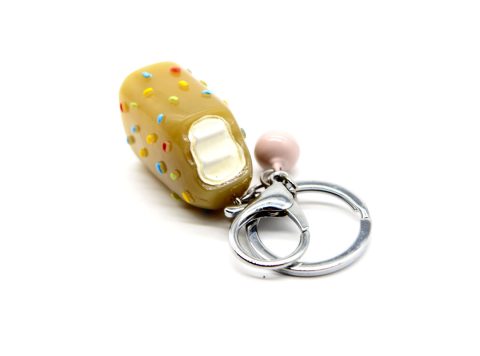 Bitten ice cream keychain, in beige color, flashing and light