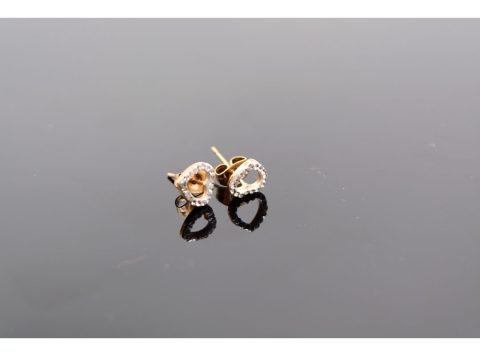 Stud-shaped studded rhinestone earrings in rose gold.