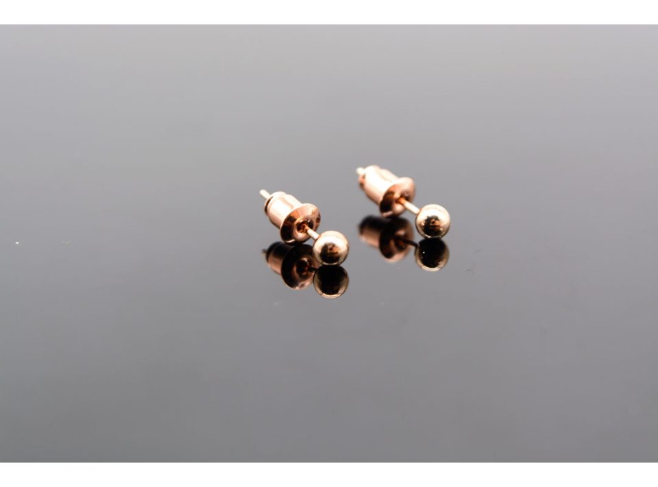 Stud earrings made of 925 silver, in the shape of a mini ball, in rose gold