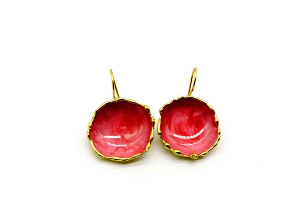 Handmade forged hollow round earring in pink-coral color.