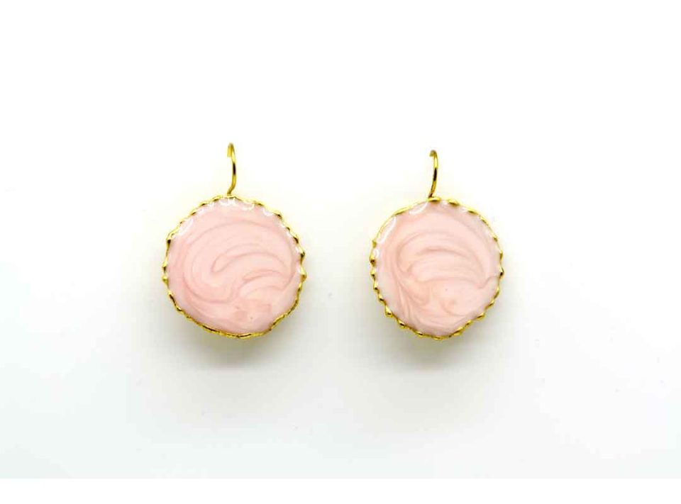 Handmade forged round large earring in pink color.