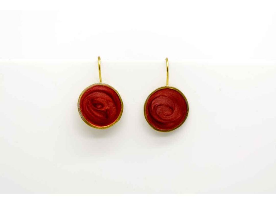 Handmade forged round earring light burgundy color.