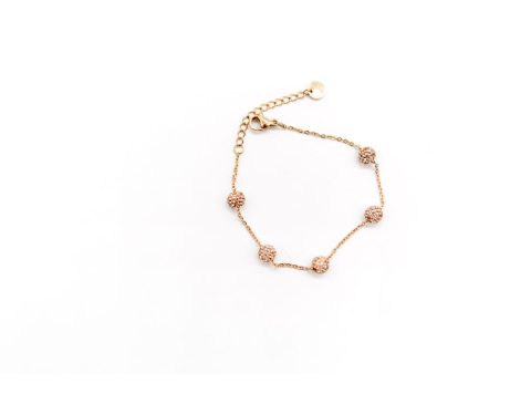 Steel bracelet in rose gold color, with rhinestone balls