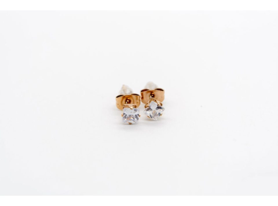 Stud earrings made of silver 925, with mini triangle rhinestones, in rose gold color