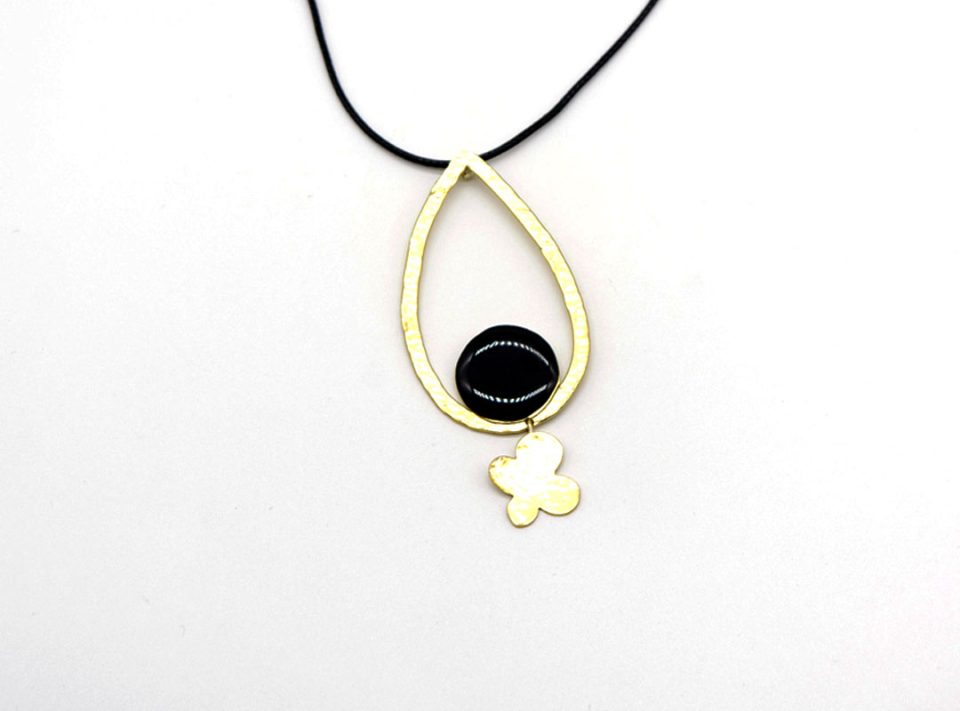 teardrop forged element necklace with black enamel and a golden butterfly