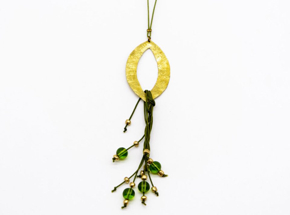 necklace forged gold element large tear perforated with green beads