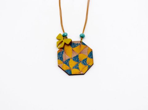 Handmade necklace with wooden polygonal element in blue with gold colors