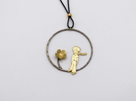 necklace wrought round element with the little prince with flower