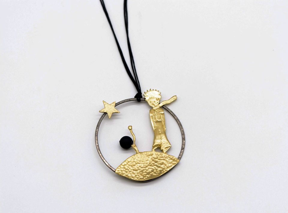 necklace forged round element with the little prince with a star