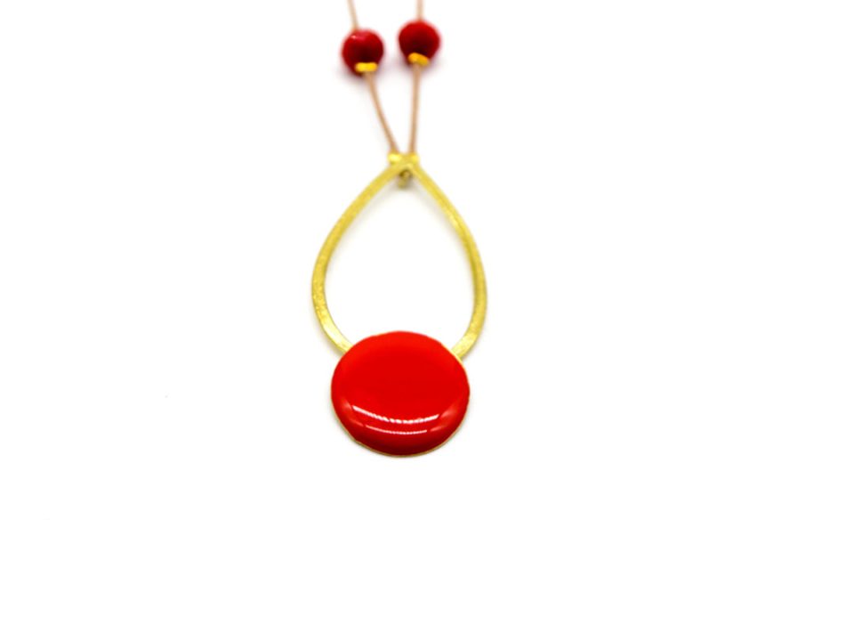 necklace with forged small tear with round embellishment with red enamel