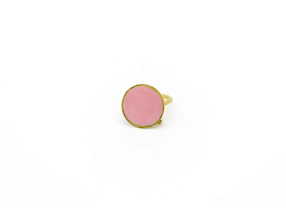 Handmade round forged ring in pink enamel color.