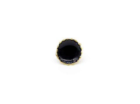 Handmade forged ring in gold color with round black color.