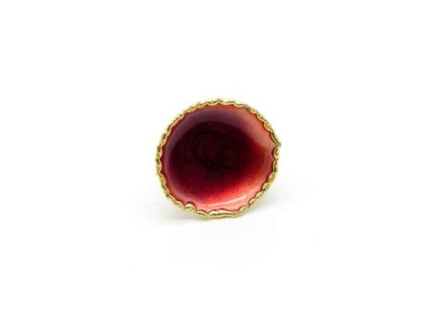 Handmade forged gold ring with round burgundy color.