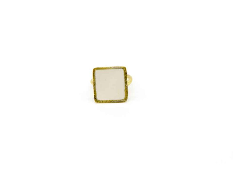 Handmade forged ring in gold square white with enamel.