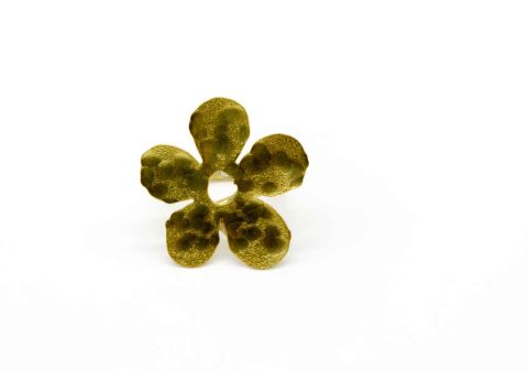 Handmade forged gold color ring with flower pattern with perforation.