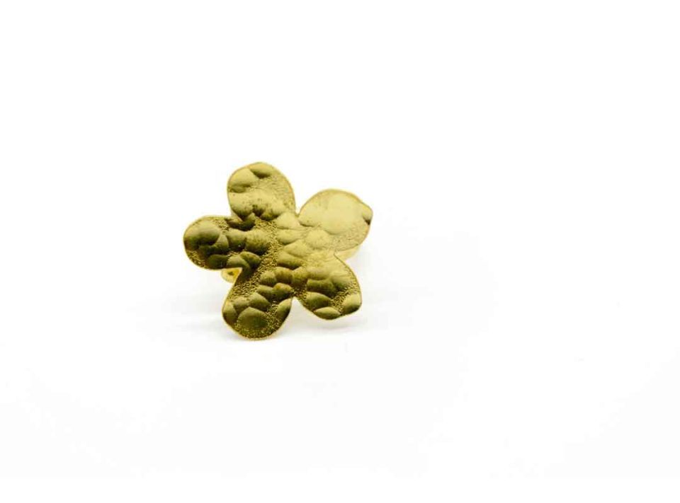 Handmade forged gold color ring with small flower design.