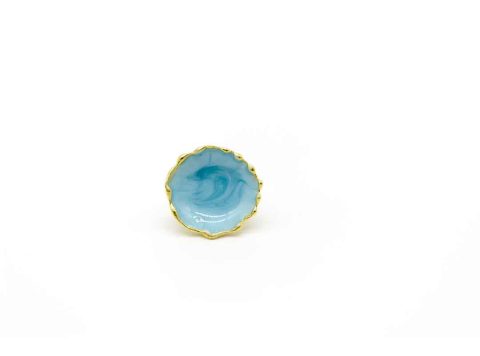 Handmade forged gold ring with round light blue enamel.