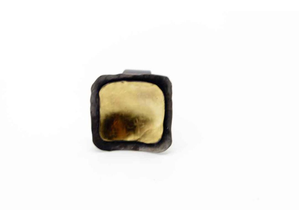 Handmade forged ring in square shape, gold with black.