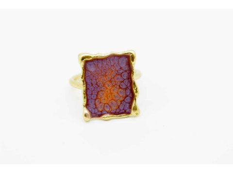 Handmade gold ring, in small rectangular shape.