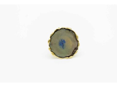 Handmade gold ring in round shape with enamel and liquid glass.