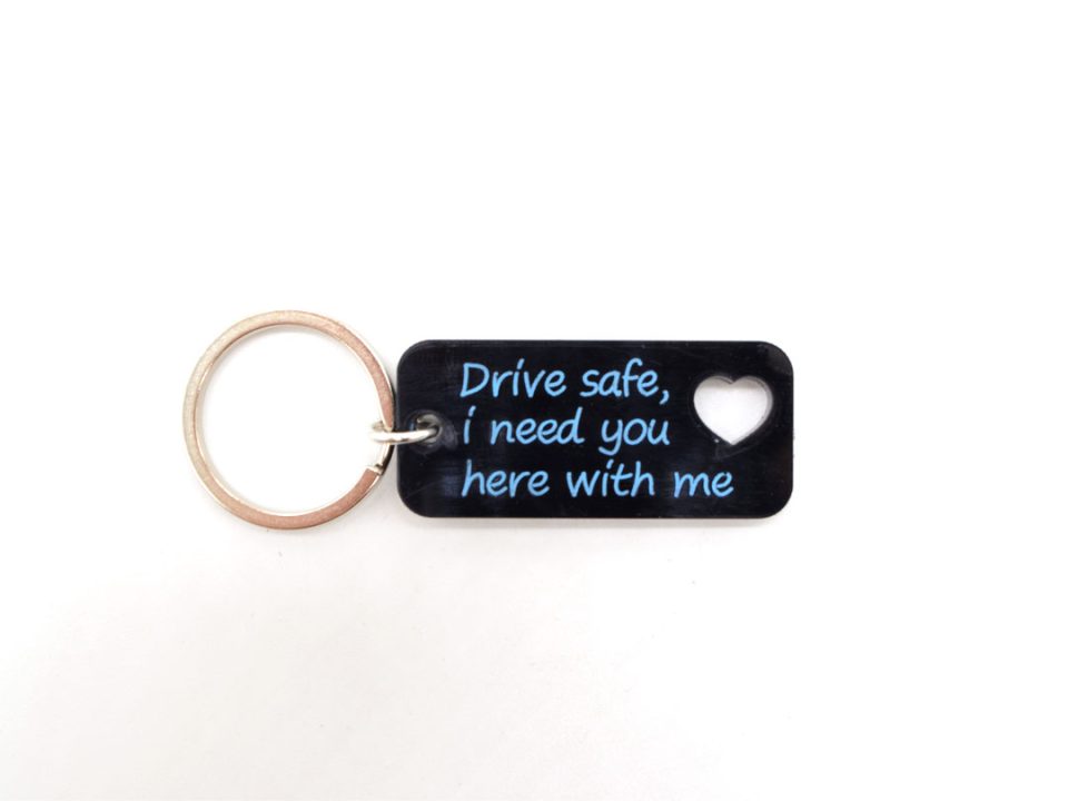 Plexi glass keychain, drive safe message