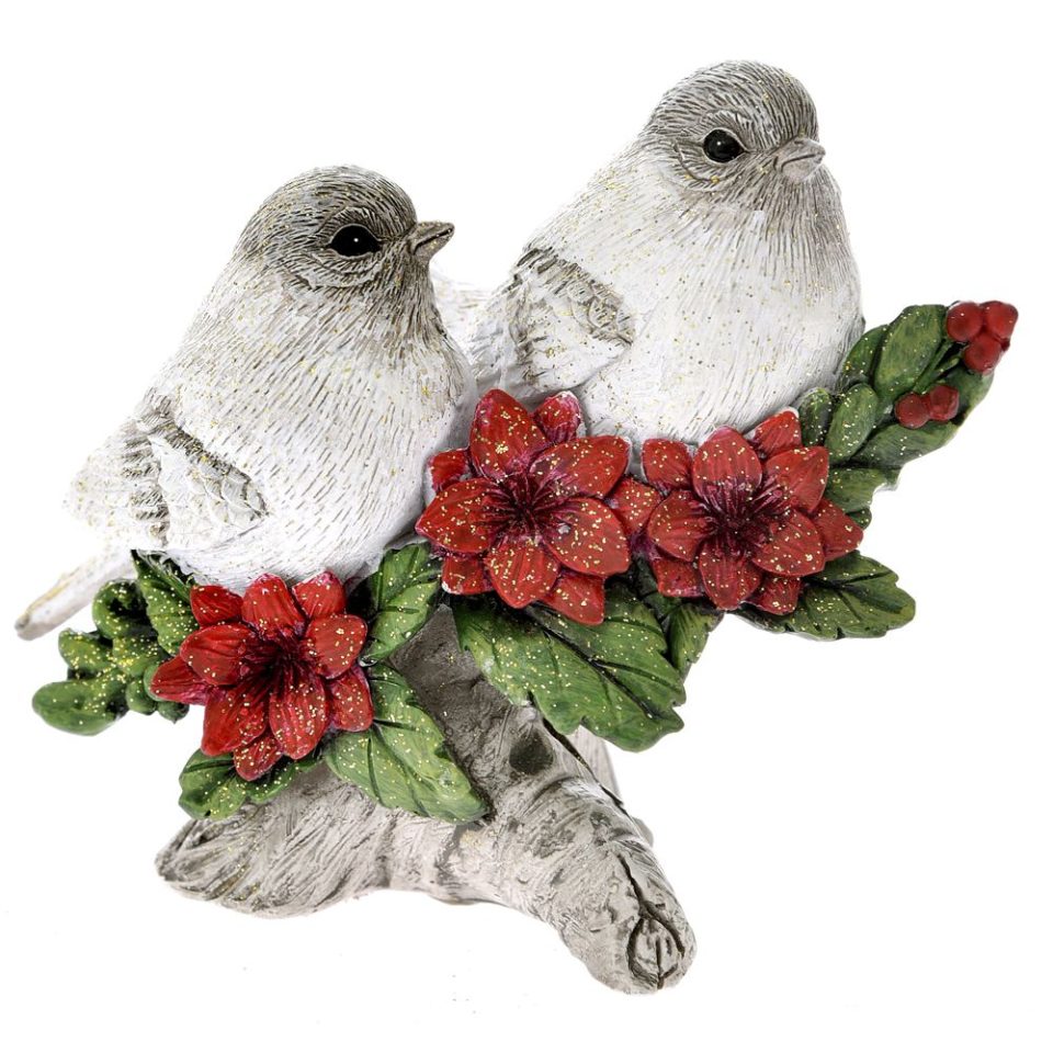 Two little birds on a Christmas branch