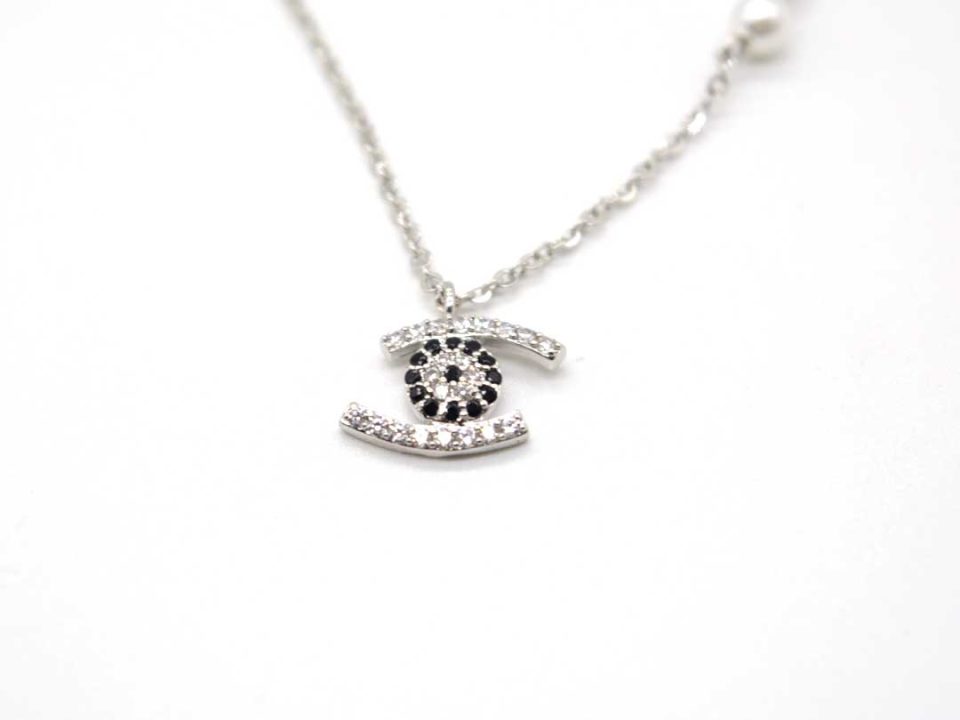 Necklace short steel in silver color rhinestone eye.