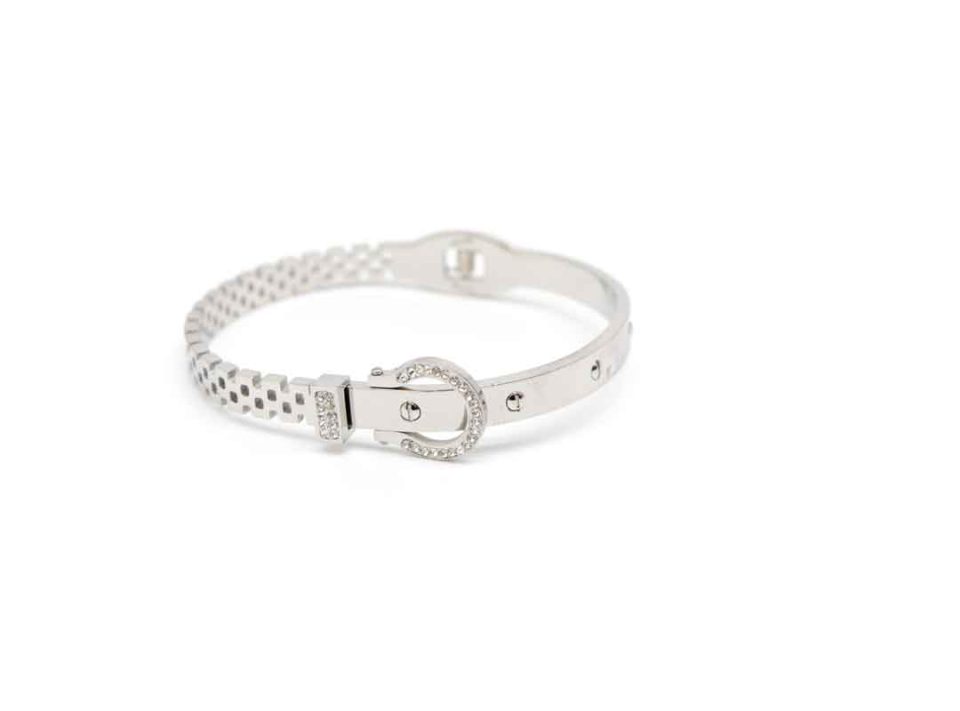 Steel handcuffs in silver color in design like a belt with rhinestones