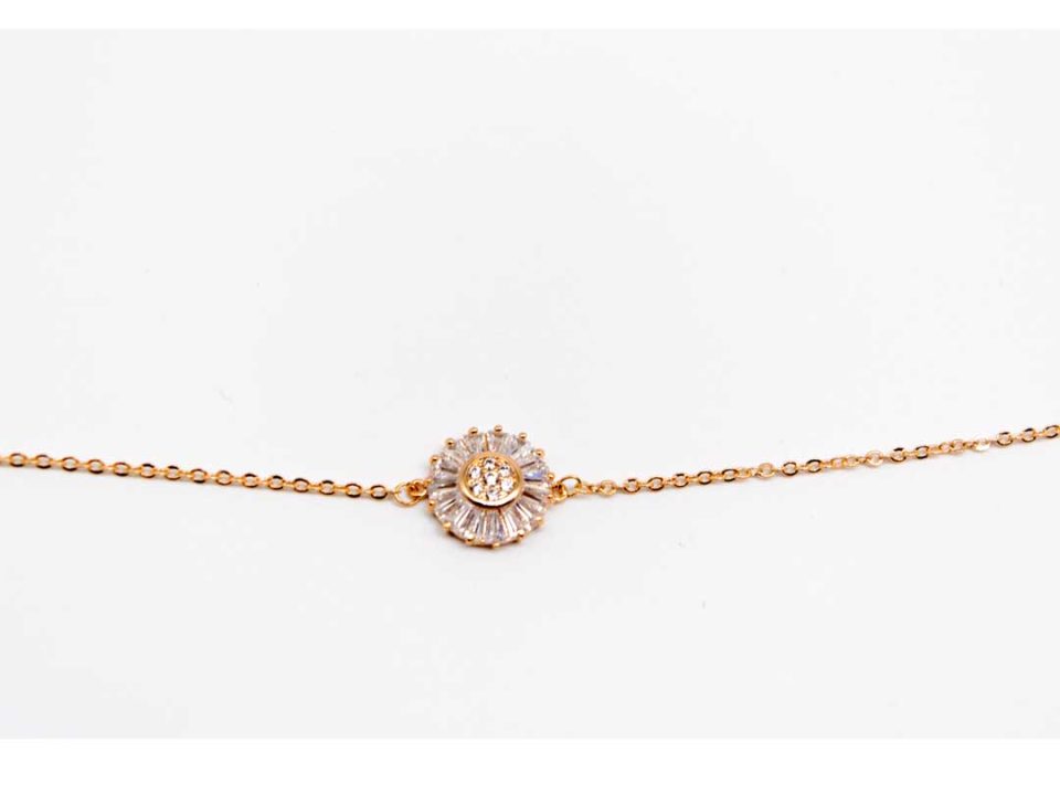 Steel bracelet in pink gold color, with a large rhinestone flower