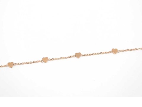 Steel bracelet in rose gold with rhinestone hearts