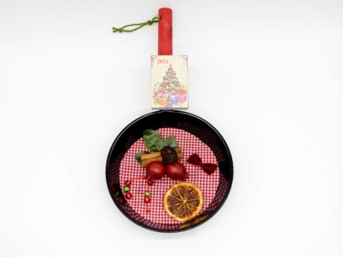 Handmade wall-mounted frying pan with pomegranates.