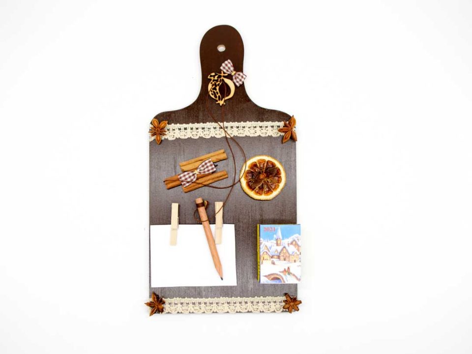 Handmade, wooden kitchen decoration, brown, with diary and notes.