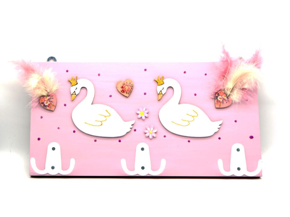 Handmade children's light pink wall hanger with swans