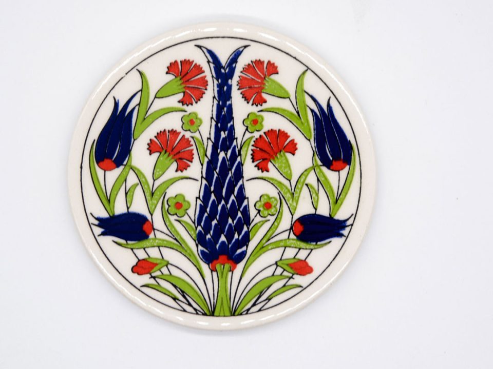 Round ceramic coaster with red flowers and blue lilies