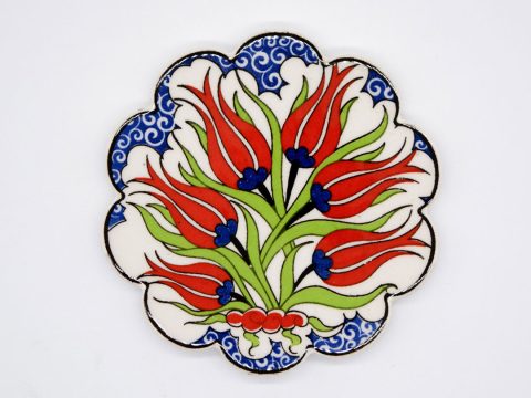 Ceramic coaster round with curves with large red lilies