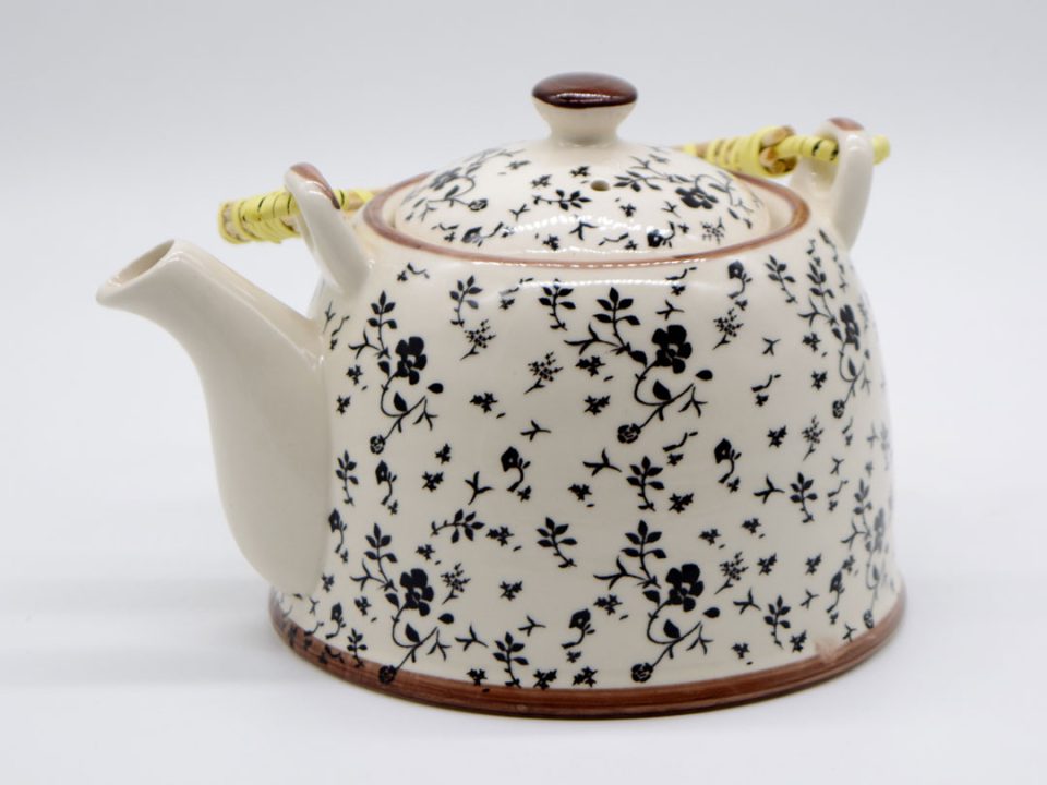 Ceramic teapot with black flowers