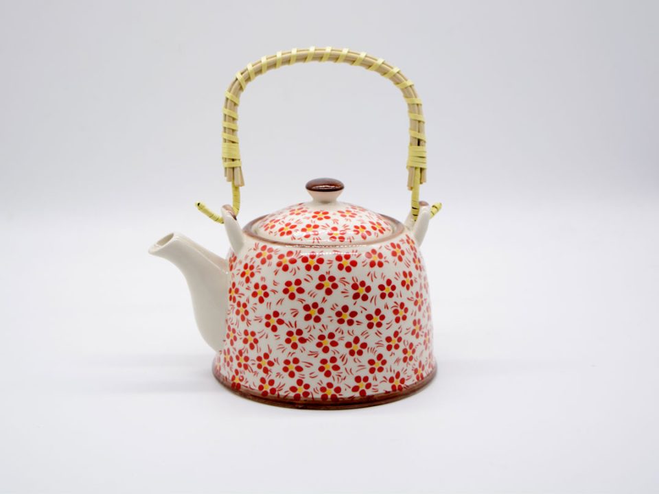 Ceramic teapot with red flowers