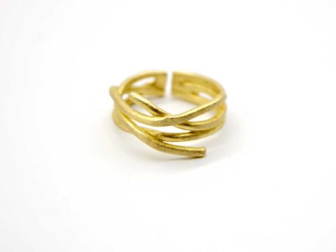 Handmade gold ring three rods tied together.