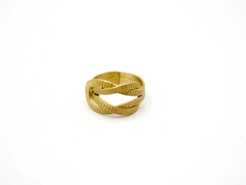 Handmade forged ring, in gold color, tied like a knot.