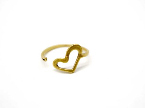 Handmade forged small gold color ring with perforated heart.