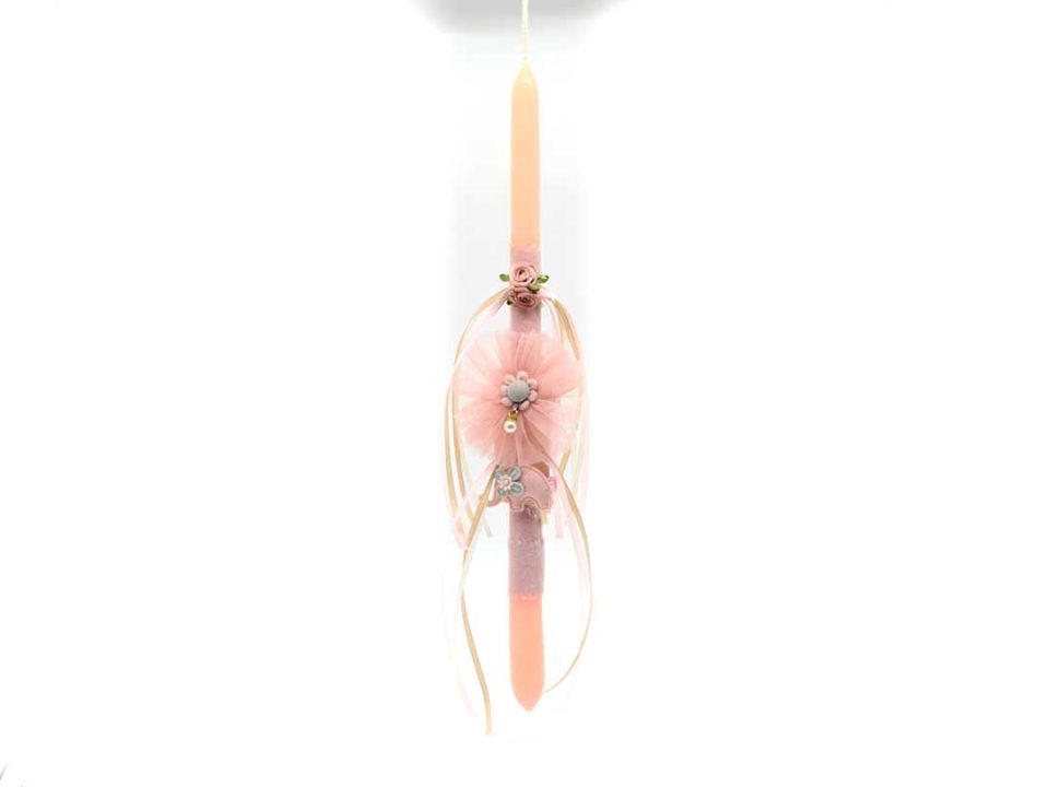 Handmade pink easter candle with hair bones