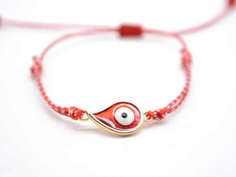 Handmade March bracelet, with gold eye with red enamel