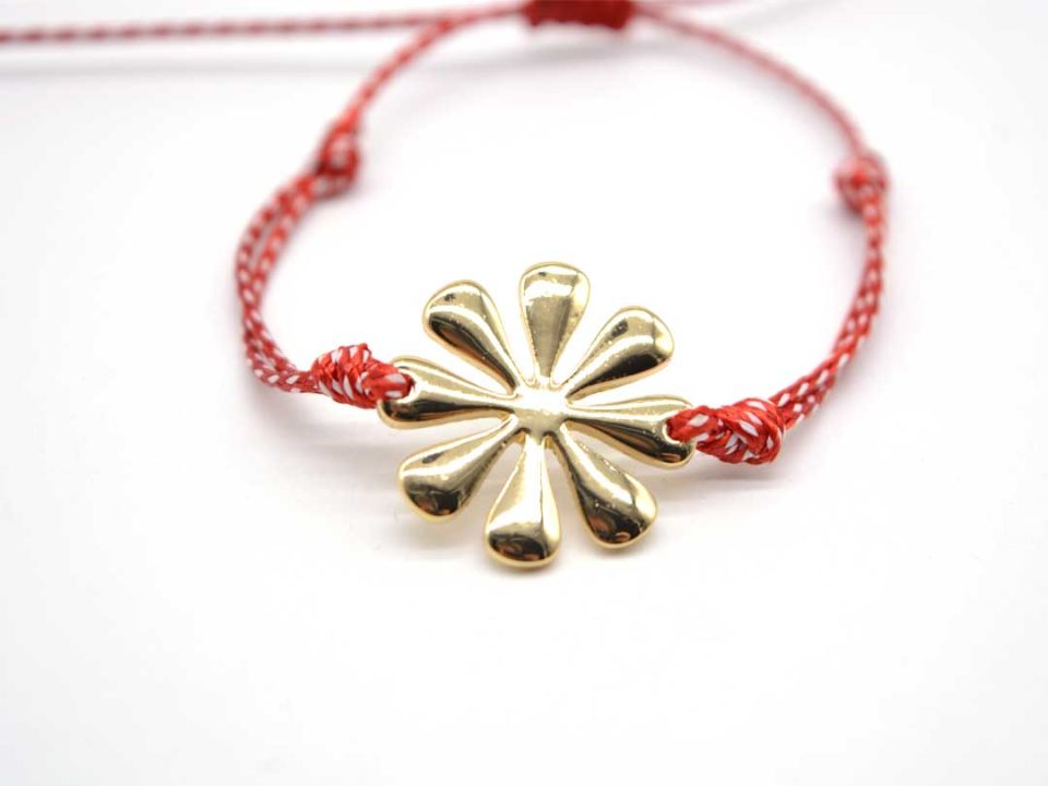 Handmade March bracelet, with large flower in gold